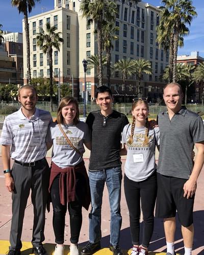 NWU math students and Dr. Austin Mohr (center) traveled to San Diego, Calif. where students listened to and presented research at the Joint Mathematics Meeting, which is the world's largest math conference.