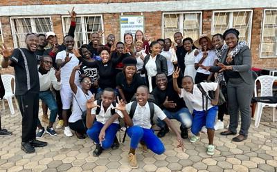 Lilly Frields with students and teachers in Rwanda during a study abroad trip. 